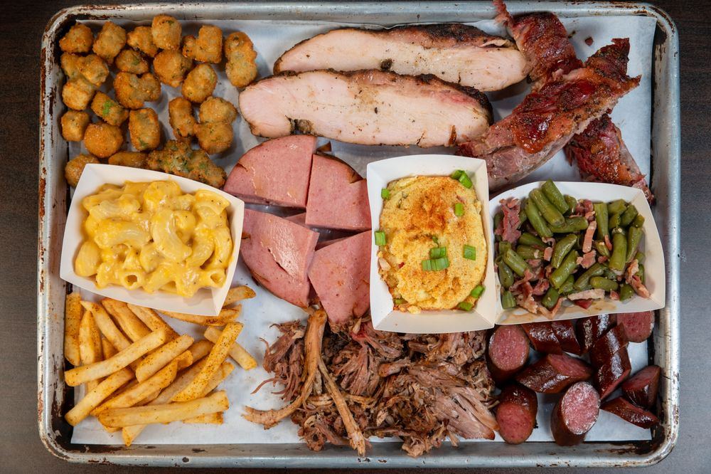 Southside Platter tray with brisket, turkey, bologna, sausage, pulled pork, mac and cheese, green beans and fried okra